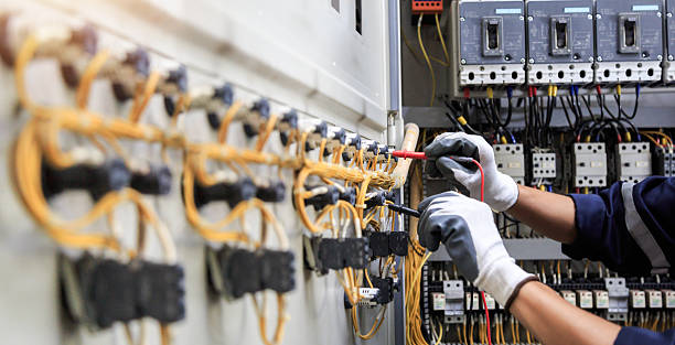 Professional Electrician technician working in Dallas Center, IA